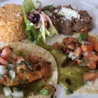 El Combo · Two item combo with choice of taco or enchilada (no beef). Served w/ rice & beans.