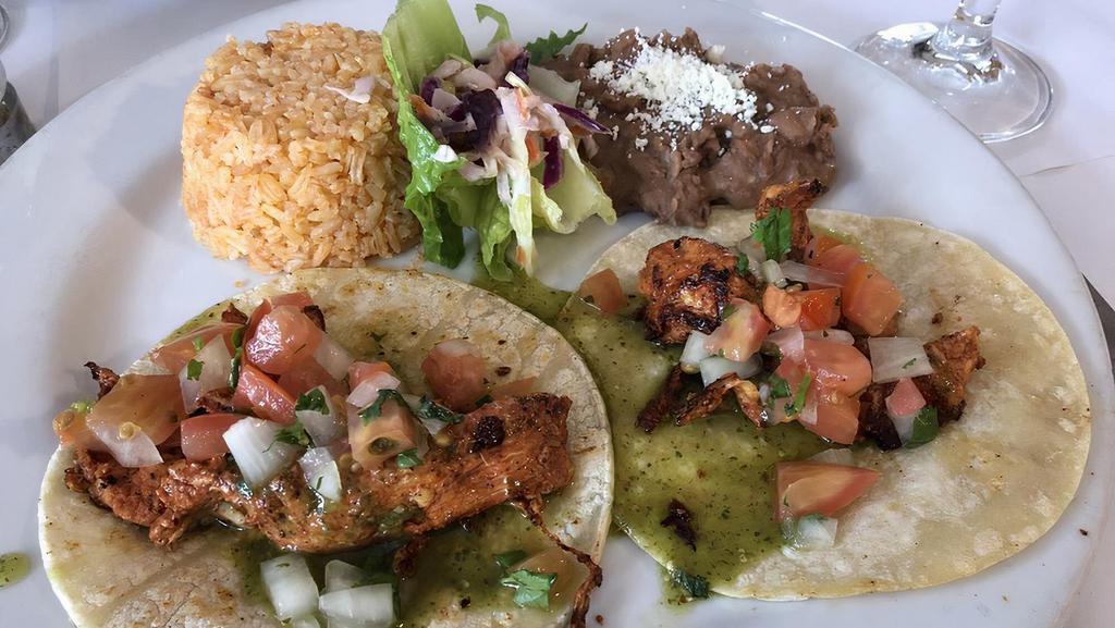 El Combo · Two item combo with choice of taco or enchilada (no beef). Served w/ rice & beans.