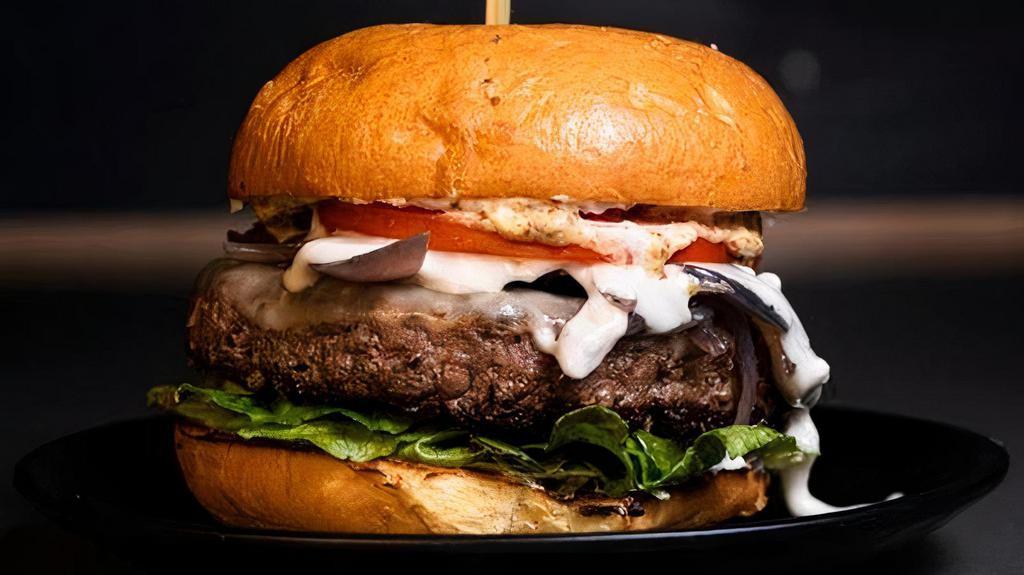 THE BLUES · 1/2 lb Wagyu Beef Patty, Provolone Cheese, Chunky Blue Cheese, Grilled Onions, Green Leaf, Tomatoes, Dijon Mustard, Mayonnaise