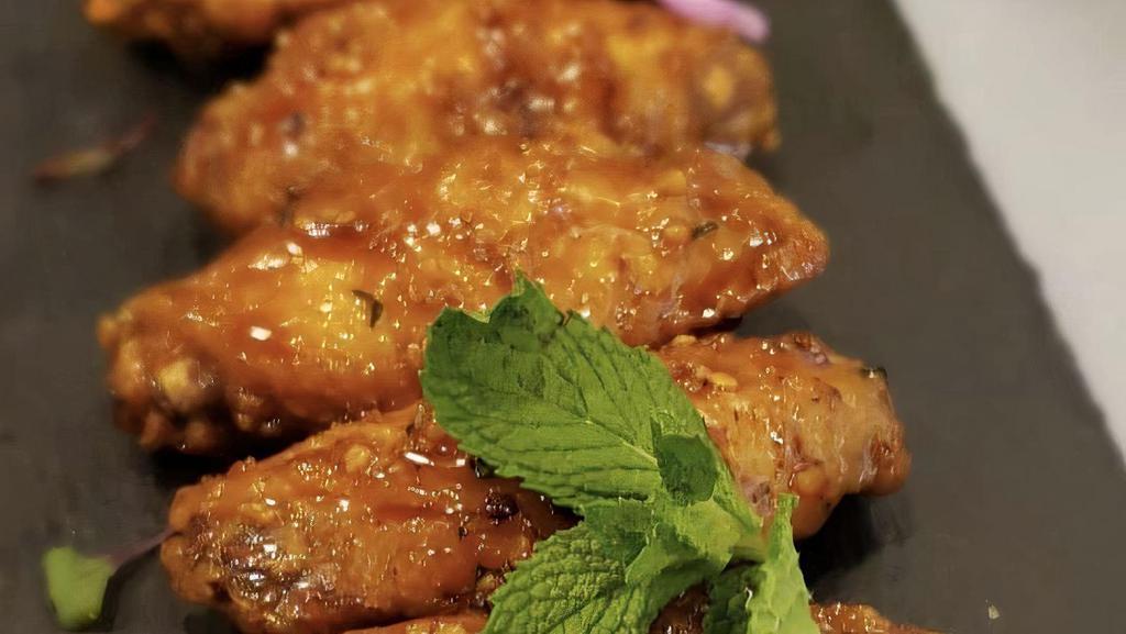7. Sticky Wings · Sweet and savory with a hint of spice.