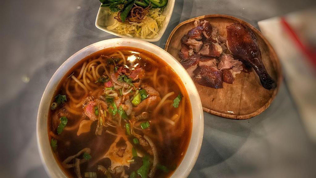 24. Duck Bun Bo Hue · Served with filet mignon, oxtail, quarter roast duck + confit.

* Consuming raw or undercooked meats, poultry, seafood, shellfish or eggs may increase your risk of foodborne illness.