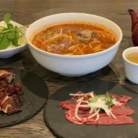 23. Bun Bo Hue · spicy beef noodle soup, served with thin vermicelli.

* Consuming raw or undercooked meats, ...