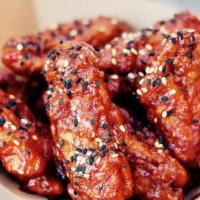 DMZ Wings (Hot) · Habanero infused bbq sauce, black pepper, sesame seeds.