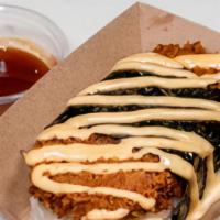 Crispy Musubi · Rice, crispy spam, teriyaki sauce, Japanese mayo, nori, side of honey sriracha