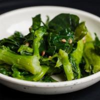 Seasoned Green Vegetable · Leafy greens seasoned in sesame oil and salt.