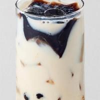 Grass Jelly Boba Milk · Fresh milk sweetened with our house-made brown sugar syrup and topped with grass jelly and b...