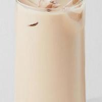 Oolong Milk Tea · Roasted oolong tea combined with our signature house milk