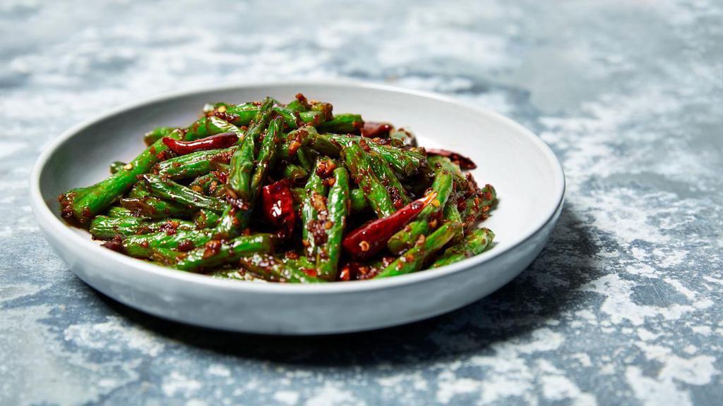 Stir Fried String Beans · Sichuan-style string beans wok-tossed with a garlic & chili sauce