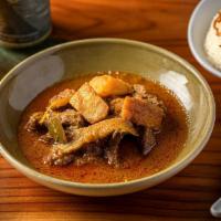 Burmese Beef Curry · Slow-cooked beef in Burmese style red curry with garlic, ginger, onion, and potatoes