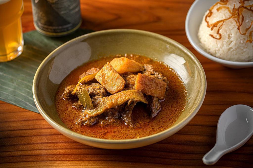 Burmese Beef Curry · Slow-cooked beef in Burmese style red curry with garlic, ginger, onion, and potatoes