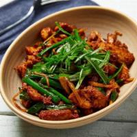 Ginger and Chili Pork Belly · Tender pork belly tossed with a garlic, ginger, Thai chilies, soy sauce, rice wine and green...