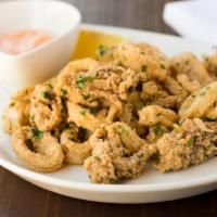 Calamari Fritti · Deep fried Farro flour Calamari served with seasonal vegetables with housemate aioli sauce