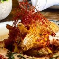 Polipo alla griglia · Mediterranean Octopus, roasted fingerling potatoes and Chimichurri sauce.