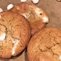 Mini White Chocolate Chip Cookie · A simple but scrumptious cookie filled with white chocolate chips.