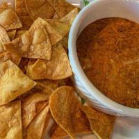 Chorizo Bean Dip · Our fresh home-made chorizo, on top of delicious home-made re-fried beans, with melted chees...