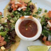 Street Tacos · 3 tasty street style tacos with choice of meat and choice of either, oc (onions and cilantro...