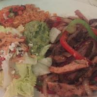 Fuego Fajitas · Choice from vegetable, seafood or meat and you are served a sauteed dish that takes you back...