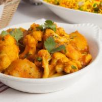 Aloo Gobhi Masala · Fresh cauliflower with potatoes cooked with herbs and spices.