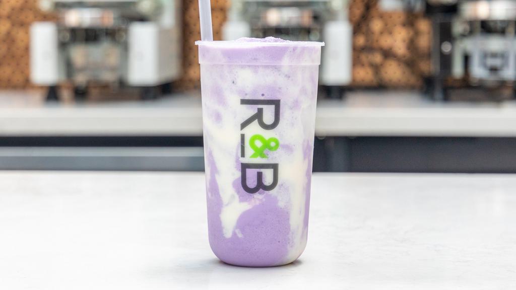 Fresh Taro Milk Tea · Fresh Taro Milk Tea with taro chunks and a touch of Ube which creates a nice deep purple color and roasty flavor.