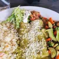 Seafood Enchiladas · Two enchiladas filled with shrimp and crab, monterey jack cheese, grilled corn, covered with...