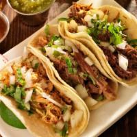 Carnitas Guadalajara Tacos · Two warm, corn tortilla tacos filled with pork carnitas, fire-roasted fajita veggies, mild a...