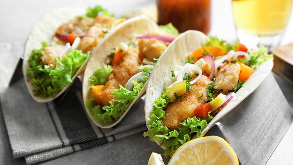Sonora Shrimp Tacos · Two tasted tacos perfectly filled with sea fresh shrimp, lettuce, tomatoes, our special Sonora sauce and delicious jack and cheddar cheeses.