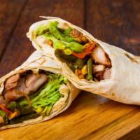 Overstuffed Grilled Burrito · Tasteful, double portion of chicken, habanero Jack cheese, salsa and guacamole. Served in a ...