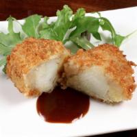 Potato Croquette · Delicately fried Russet and Yukon gold potato croquette with caramelized onions.