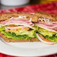 Italian Combo Sandwich · Includes mustard, mayonnaise, lettuce, tomato, pickles, onions, peperoncino, jalapeno, oil, ...