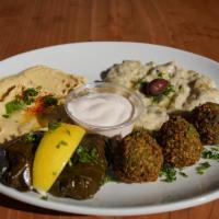 Veggie Combo Plate · Hummus, baba ghanoush, dolma and falafel. No substitution.
