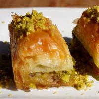 Baklava · Phyllo layers, walnuts, pistachio, and simple.