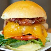 American Pride · Favorites. All natural grass-fed beef, honey smoked bacon, cheddar cheese, lettuce, tomato, ...