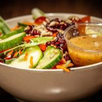 House Salad · Vegetarian. Organic fresh mixed greens, cherry tomatoes, cucumbers, carrots, sunflower seeds...