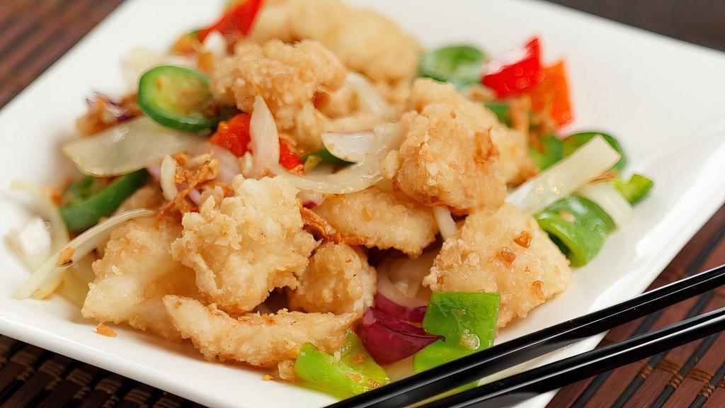 A9. Salt & Pepper Calamari · Crispy calamari wok tossed in garlic, onion, jalapeno.