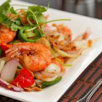 A11. Salt & Pepper Prawns · Crispy shrimp wok tossed in garlic, onion, jalapeno.