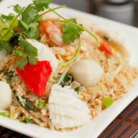 R12. Seafood Fried Rice · Shrimp, fish ball, squid, crab stick, egg, basil, onion.