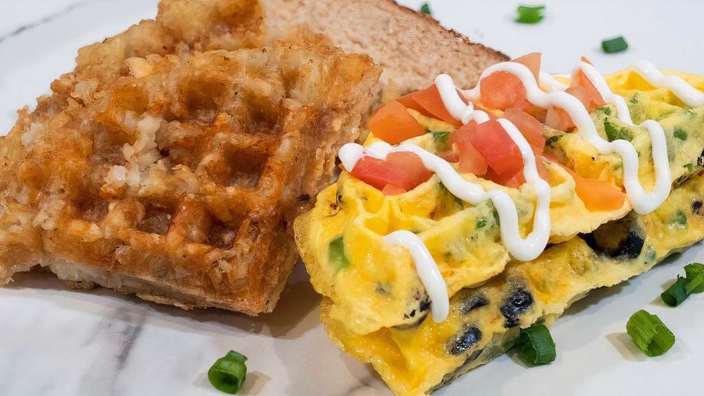 Farmer's Omelette · Green Bell Peppers, Tomatoes, Olives, Green Onions, Shredded Cheddar Cheese, Eggs