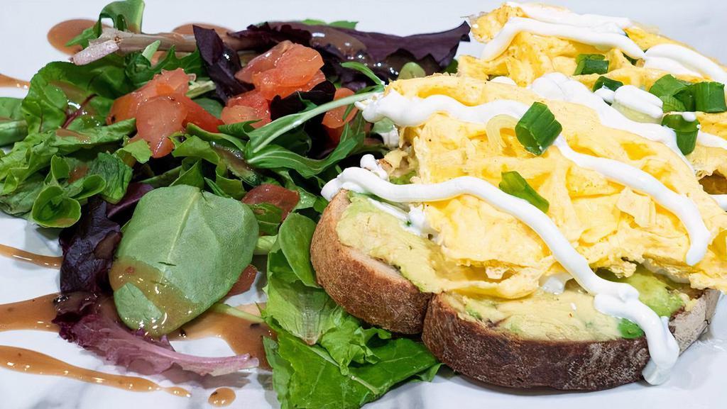 Womelette Toast · Avocado, Egg Womelette, Green Onions and Sour Cream