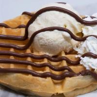 Tella Cream · Waffle, vanilla ice cream, nutella, topped with whipped cream.