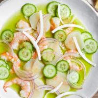 Aguachile Verde · Lime fermented shrimp, sliced onion, sliced cucumber, sliced tomato, avocado on top, sprinkl...