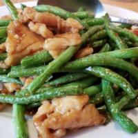 STRING BEANS WITH CHICKEN · Slices of  chicken breast meat sauteed with string beans in our special brown sauce.