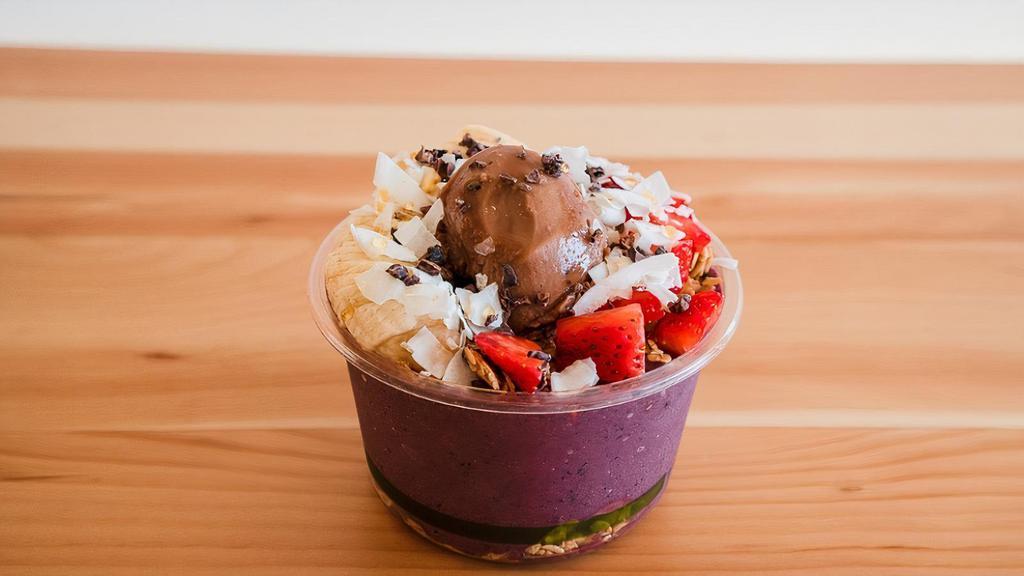 Cacao Energy · Crafted with Almond Milk, Acai, Banana, Strawberry & Blueberry, and Maca Powder. Topped with GF Granola, Banana, Strawberry, Raw Cacao Nibs, Coconut Chips, Honey, and Cacao Custard.