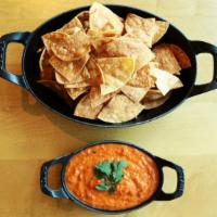 Chips & Salsa · housemade salsa naranja (spicy and deliciously addictive!), serves 1 2

(vegan, gluten free)