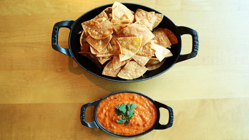 Chips & Salsa · housemade salsa naranja (spicy and deliciously addictive!), serves 1 2

(vegan, gluten free)