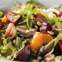BEETS & GOAT CHEESE · roasted beets and chevre served with orange, candied walnuts, micro greens and balsamic vina...