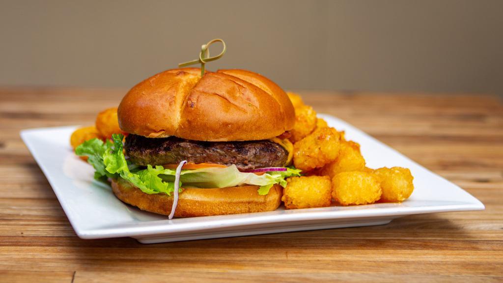 THE PATIO BURGER · half pound angus burger topped with choice of cheese, lettuce, tomato, onion and garlic aioli.
