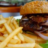 FAMOUS BOURBON STREET BURGER · half pound angus patty topped with bleu cheese, grilled onions, praline candied bacon, lettu...