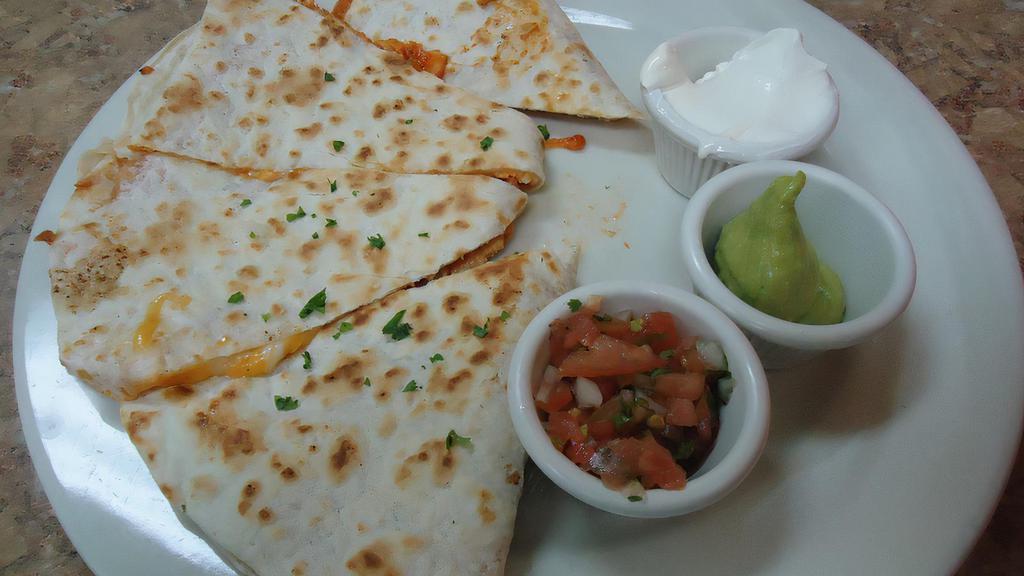 PATIO QUESADILLA · soft flour tortilla filled with black beans, grilled onions, bell peppers and oaxaca cheese, served with sour cream, guacamole and salsa's
add chicken, carnitas or seasoned ground beef 4~ shrimp 6~