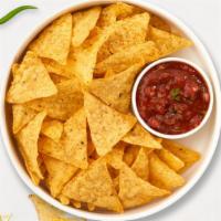 Lola Salsa & Chips · Warm up with toasty tortilla chips served with a side of tangy salsa.