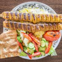 Beef Koobideh · 2 skewers beef Koobideh serve with grilled tomato, salad, and bread